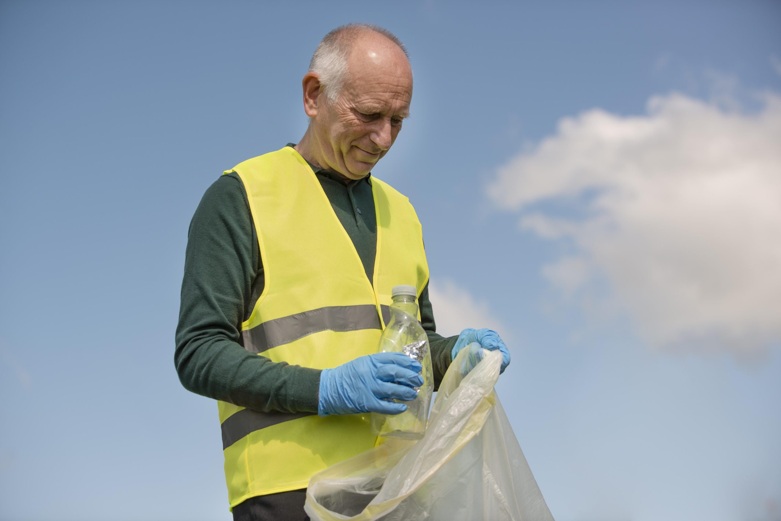 man-doing-community-service-by-collecting-trash