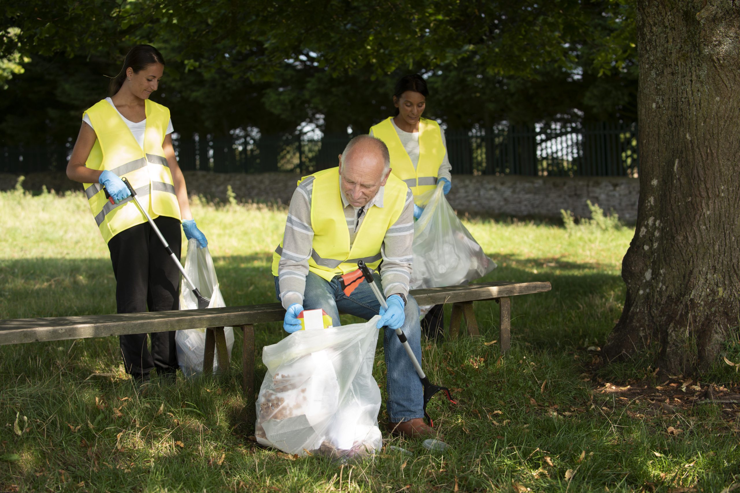 people-doing-community-service-by-collecting-trash-nature (1)